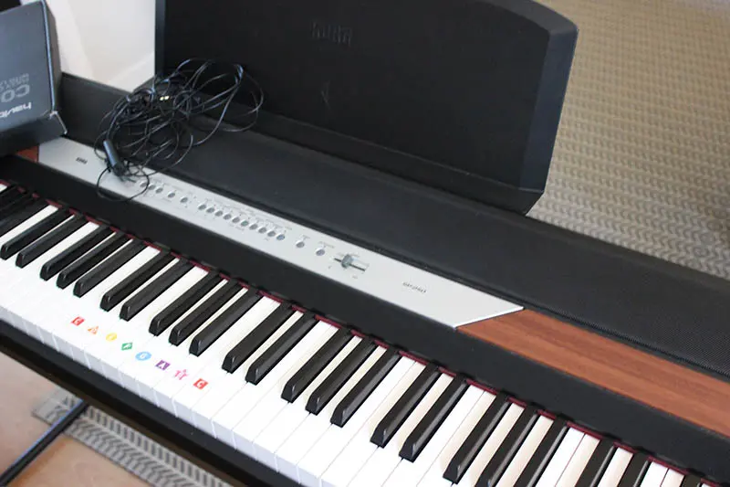 A piano sitting on top of a table.