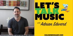 A man sitting at the piano in front of a yellow wall.