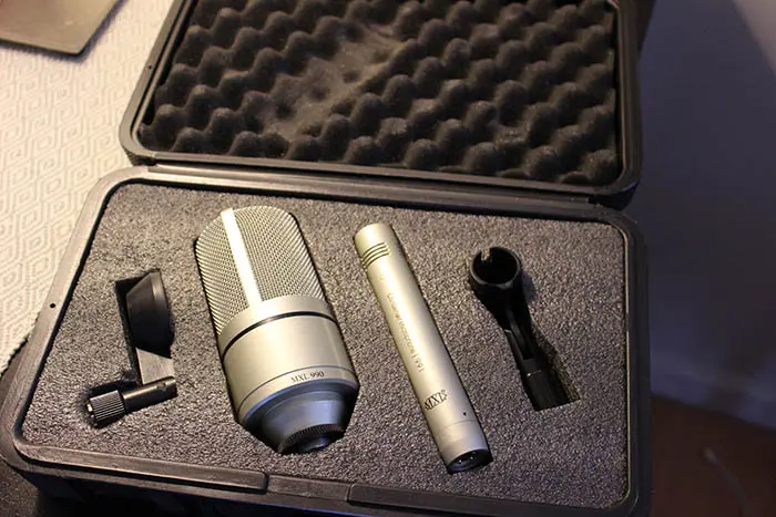 A microphone case with some parts in it