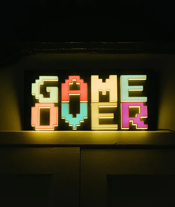 A neon sign that says game over.