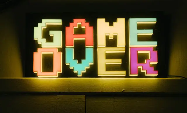 A neon sign that says game over.