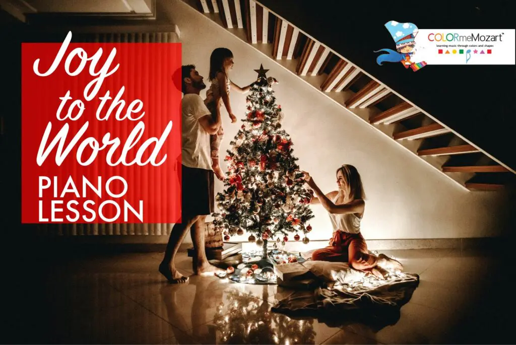 A family decorating the christmas tree in their home.