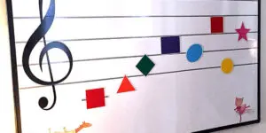 A sheet music with different shapes and colors on it.