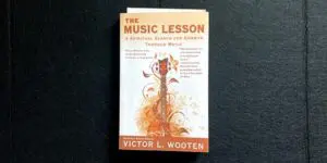 A book cover with an image of a guitar.