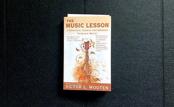 A book cover with an image of a guitar.