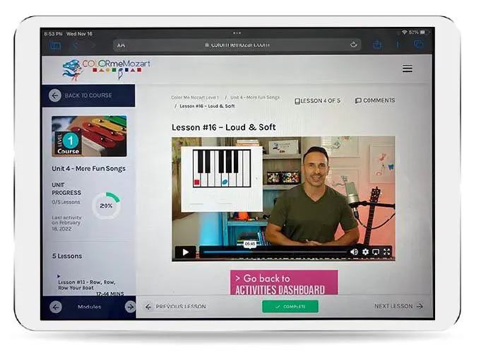 A computer screen with an image of a man playing piano.