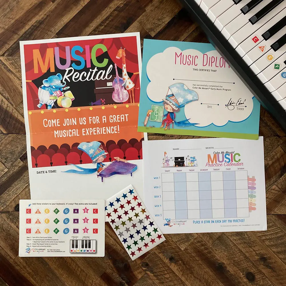 A table with several different colored stickers and music books.