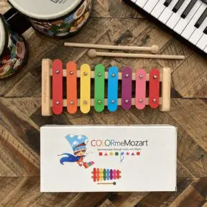 A wooden xylophone sitting on top of a table.