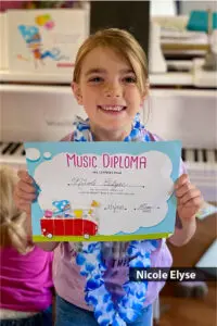 Nicole Elyse with Color Me Mozart diploma