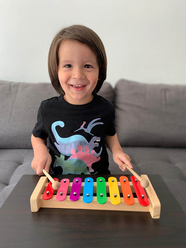 Sebastian playing the xylophone