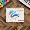 A picture of an album with a piano keyboard and some colored keys.