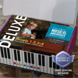 A box with a child playing the piano on it.