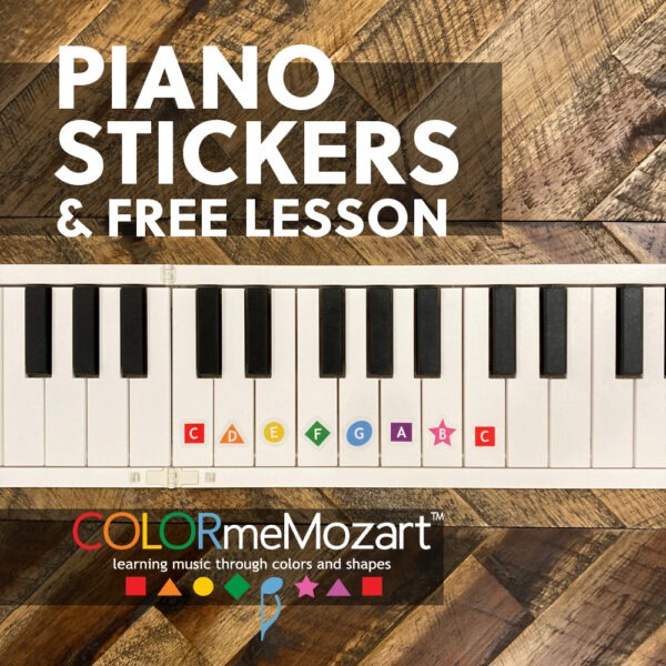 A piano sticker sheet with the words " colormemozart " underneath it.